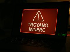 Advertencia de troyano minero en la pantalla de un portátil, representando la amenaza de Altruistics.