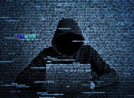 Silueta de un hacker anónimo formada por una matriz de datos digitales, representando el falso ransomware 0apt